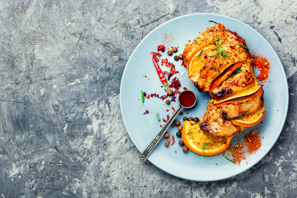 Roasted Pork Meat Stuffed With Orange And Seasonings