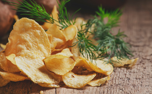 Salted Potato Chips On Wooden Table, Rustic Style, Selective Focus